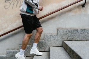 Man walking up stairs